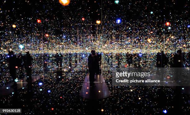 Picture of the art installation "Infinity Mirrored Room - The Souls of Millions of Light Years Away, 2013" taken at the exhibition "Never Ending...