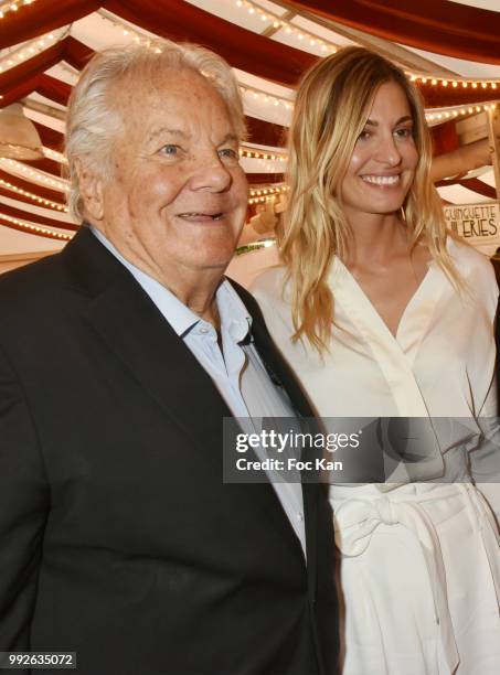 Massimo Gargia and actress Sveva Alviti attend "La Femme Dans Le Siecle" Dinner on July 5, 2018 in Paris, France.