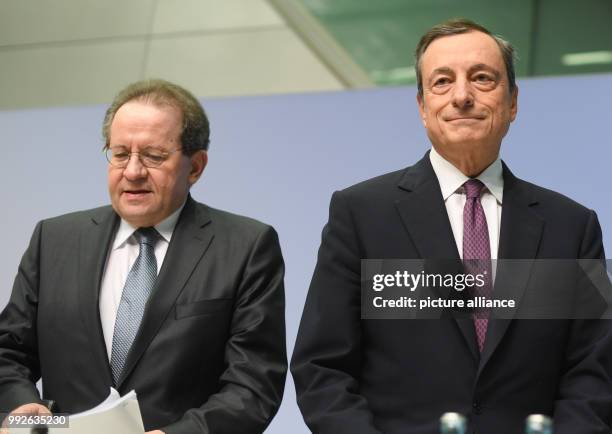 European Central Bank President, Mario Draghi , and deputy Vitor Constancio attend a press conference at the bank's headquarters in Frankfurt,...