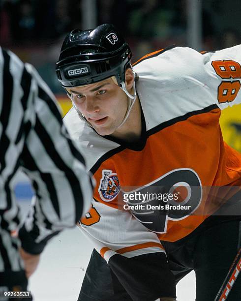 Eric Lindros of the Philadelphia Flyers faces off against the Montreal Canadiens in the 1990's at the Montreal Forum in Montreal, Quebec, Canada.