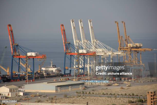 Heavy-duty cranes towering above the first, 602-meter long quay of the port of Gwadar in Baluchsitan, in the southernmost tip of Pakistan, 03 October...