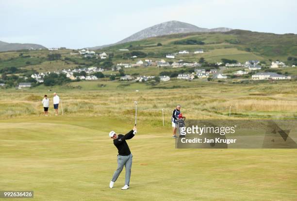 Paul Dunne of Ireland plays his second shot on the 10th hole during the second round of the Dubai Duty Free Irish Open at Ballyliffin Golf Club on...