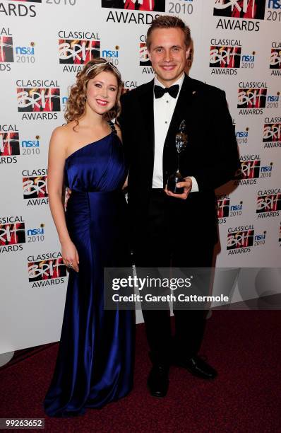 Vasily Petrenko poses with the Male Artist of the Year Award and Hayley Westenra during the Classical BRIT Awards at Royal Albert Hall on May 13,...