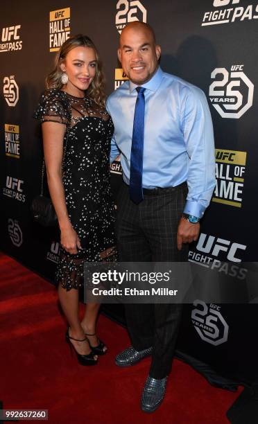 Model Amber Nichole Miller and mixed martial artist Tito Ortiz arrive at the UFC Hall of Fame's class of 2018 induction ceremony at Palms Casino...