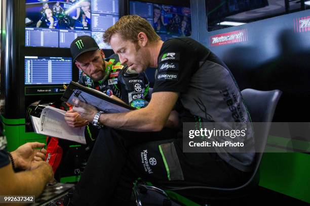 Tom Sykes of Kawasaki Racing Team speaks in box with mechanics during the free practice of the Motul FIM Superbike Championship, Riviera di Rimini...