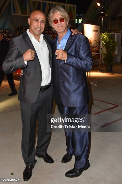 Arthur Abraham and Eric Roberts during the European Union Sustainable Fashion Festival on July 3, 2018 in Berlin, Germany.