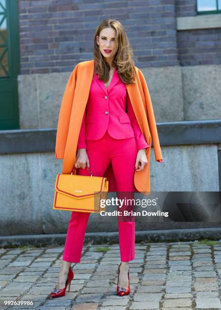 Alexandra Lapp poses during the Marc Cain Street Style shooting at WECC on July 3, 2018 in Berlin, Germany.