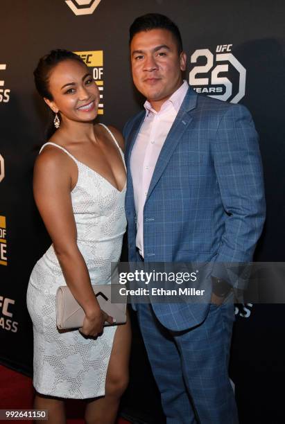 Mixed martial artist Michelle Waterson and her husband Joshua Gomez arrive at the UFC Hall of Fame's class of 2018 induction ceremony at Palms Casino...