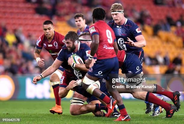 Geoff Parling of the Rebels is tackled during the round 18 Super Rugby match between the Reds and the Rebels at Suncorp Stadium on July 6, 2018 in...