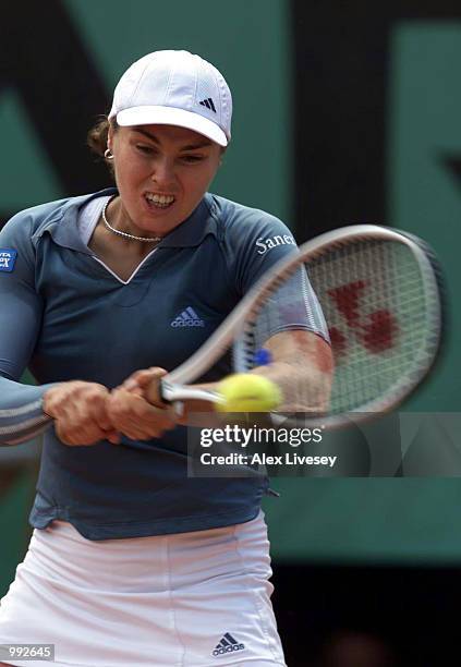 Martina Hingis of Switzerland returns in her Quarter final match against Francesca Schiavone of Italy during the French Open Tennis at Roland Garros,...