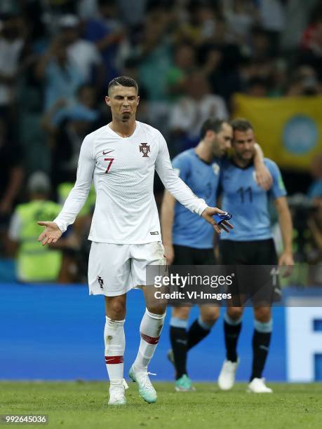 Cristiano Ronaldo of Portugal, Diego Godin of Uruguay, Cristhian Stuani of Uruguay during the 2018 FIFA World Cup Russia round of 16 match between...