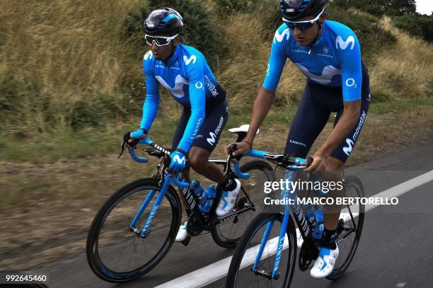 Colombia's Nairo Quintana and Spain's Marc Soler ride during a training session of Spain's Movistar Team cycling team on July 6, 2018 between...