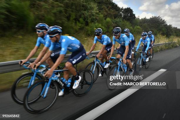 Riders of Spain's Movistar Team cycling team pedal during a training session on July 6, 2018 between Chemille-Melay and Cholet, western France, on...