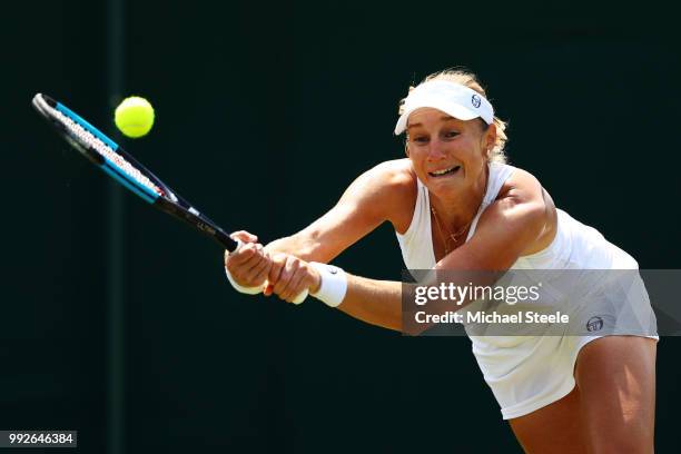 Ekaterina Makarova of Russia plays a backhand in her Ladies' Singles third round match against Lucie Safarova of Czech Republic on day five of the...