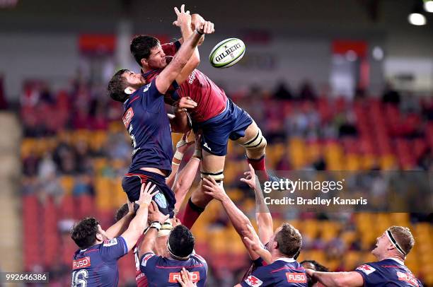Liam Wright of the Reds and Geoff Parling of the Rebels competes at the lineout during the round 18 Super Rugby match between the Reds and the Rebels...