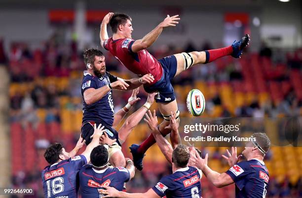 Liam Wright of the Reds and Geoff Parling of the Rebels competes at the lineout during the round 18 Super Rugby match between the Reds and the Rebels...