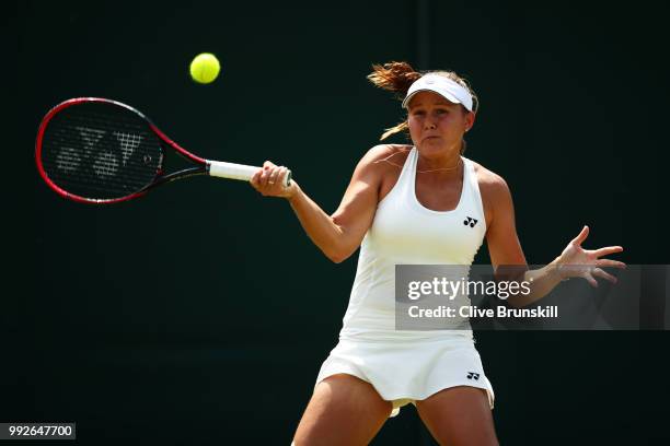 Evgeniya Rodina of Russia returns a shot against Madison Keys of the United States during their Ladies' Singles third round match on day five of the...