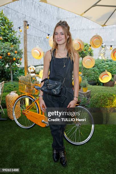 At the opening of the ephemeral restaurant Le Jardin de Joy in the Hotel Barriere Le Fouquet's, Zoe Marchal is photographed for Paris Match on june...