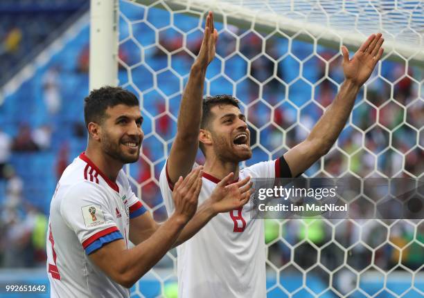 Morteza Pouraliganji of Iran celebrates at full time during the 2018 FIFA World Cup Russia group B match between Morocco and Iran at Saint Petersburg...