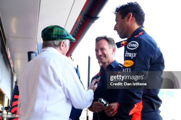 Daniel Ricciardo of Australia and Red Bull Racing, and Red Bull Racing Team Principal Christian Horner meet Sir Jackie Stewart and Prince Edward Duke...