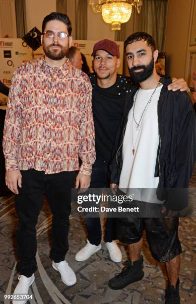 Piers Agget, Kesi Dryden and Amir Amor of Rudimental attend the Nordoff Robbins O2 Silver Clef Awards at The Grosvenor House Hotel on July 6, 2018 in...