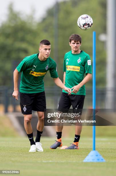 Laszlo Benes and Jonas Hofmann during a training session of Borussia Moenchengladbach at Borussia-Park on July 05, 2018 in Moenchengladbach, Germany.