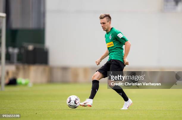 Patrick Herrmann runs during a training session of Borussia Moenchengladbach at Borussia-Park on July 05, 2018 in Moenchengladbach, Germany.