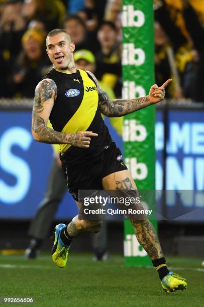 Dustin Martin of the Tigers celebrates kicking a goal during the round 16 AFL match between the Richmond Tigers and the Adelaide Crows at Melbourne...