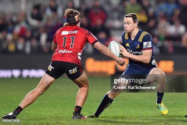 Ben Smith of the Highlanders charges forward during the round 18 Super Rugby match between the Crusaders and the Highlanders at AMI Stadium on July...