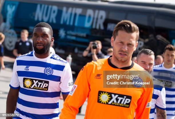 Richard Sukuta-Pasu and Daniel Davari of MSV Duisburg are seen during the team presentation at Thyssenkrupp Steel Europe AG on July 6, 2018 in...