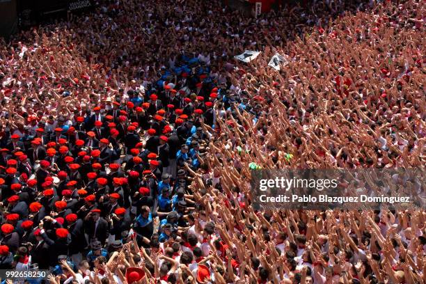 Revellers enjoy the atmosphere during the opening day or 'Chupinazo' of the San Fermin Running of the Bulls fiesta on July 6, 2018 in Pamplona,...