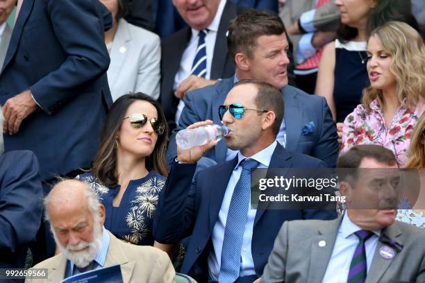 Sergio Garcia and wife Angela Akins Garcia attend day five of the Wimbledon Tennis Championships at the All England Lawn Tennis and Croquet Club on...