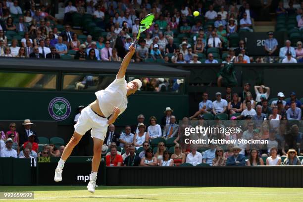 Sam Querrey of the United States serves against Gael Monfils of France during their Men's Singles third round match on day five of the Wimbledon Lawn...