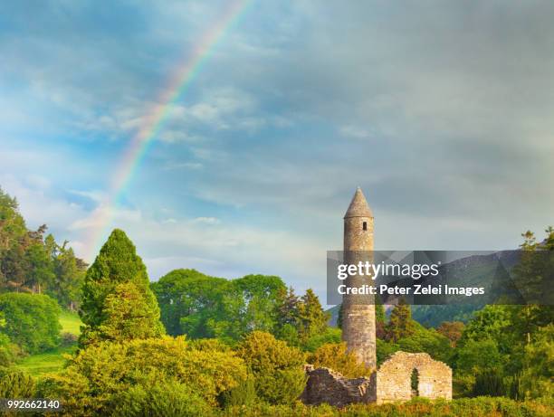 glendalough monastic site in ireland with a rainbow - ireland rainbow stock pictures, royalty-free photos & images