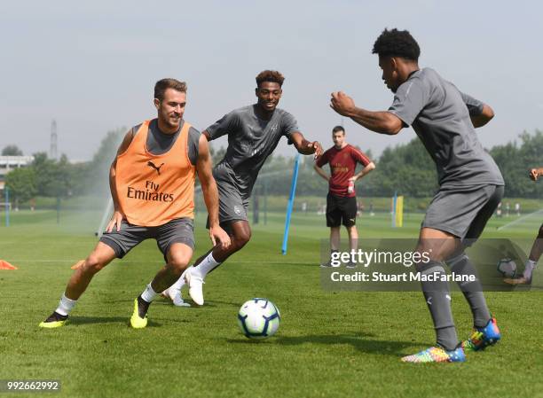 Aaron Ramsey and Reiss Nelson of Arsenal during a training session at London Colney on July 6, 2018 in St Albans, England.