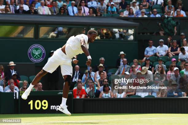 Gael Monfils of France serves against Sam Querrey of the United States during their Men's Singles third round match on day five of the Wimbledon Lawn...