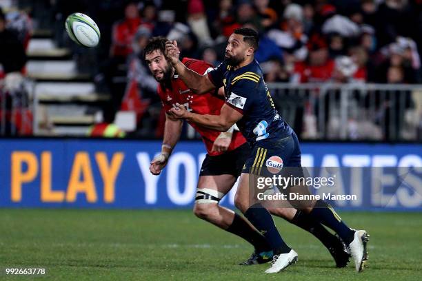 Lima Sopoaga of the Highlanders passes the ball during the round 18 Super Rugby match between the Crusaders and the Highlanders at AMI Stadium on...