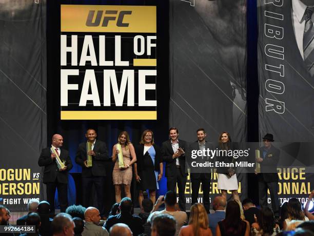 Former mixed martial artists Matt Serra and Dan Henderson, family members of the late UFC producer Bruce Connal, Carly Connal, Karen Connal, Trevor...