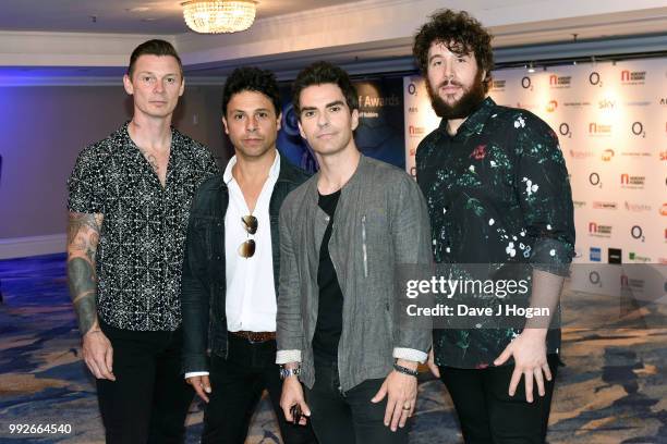 Richard Jones, Adam Zindani, Kelly Jones and Jamie Morrison of the Stereophonics attend the Nordoff Robbins' O2 Silver Clef Awards at Grosvenor...