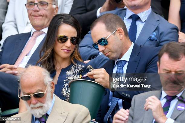 Sergio Garcia and wife Angela Akins Garcia attend day five of the Wimbledon Tennis Championships at the All England Lawn Tennis and Croquet Club on...