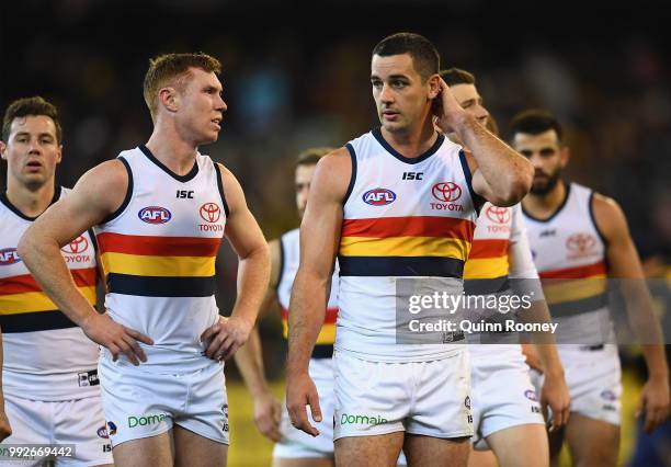 Tom Lynch and Taylor Walker of the Crows look dejected after losing the round 16 AFL match between the Richmond Tigers and the Adelaide Crows at...