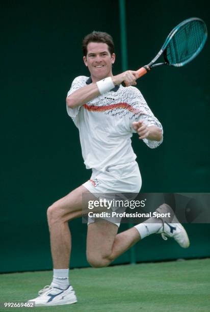 Chris Wilkinson of Great Britain in action during the Wimbledon Lawn Tennis Championships at the All England Lawn Tennis and Croquet Club circa June,...