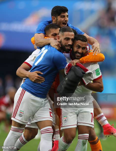 Ashkan Dejagah of Iran celebrates during the 2018 FIFA World Cup Russia group B match between Morocco and Iran at Saint Petersburg Stadium on June...