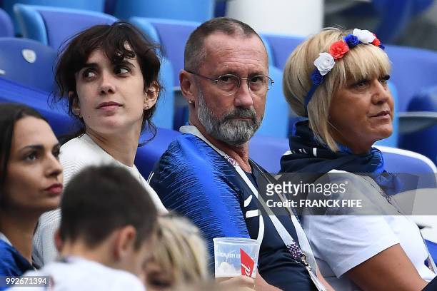 France's forward Antoine Griezmann's sister, Maud and parents, Alain and Isabelle wait for the start of the the Russia 2018 World Cup quarter-final...