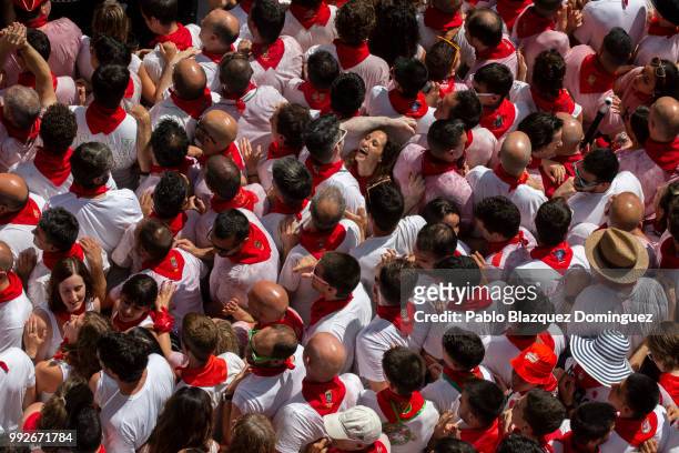 Revellers enjoy the atmosphere during the opening day or 'Chupinazo' of the San Fermin Running of the Bulls fiesta on July 6, 2018 in Pamplona,...