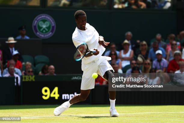 Gael Monfils of France returns a shot against Sam Querrey of the United States during their Men's Singles third round match on day five of the...
