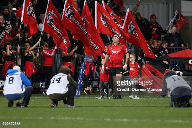 Wyatt Crockett, the most capped player in Super Rugby history, runs out onto the field for his 200th appearance for the Crusaders ahead of the round...
