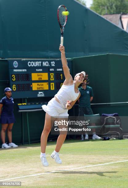 Marion Bartoli of France serves against Greta Arn of Hungary in the Womens Singles third round on day five of the 2010 Wimbledon Championships at the...