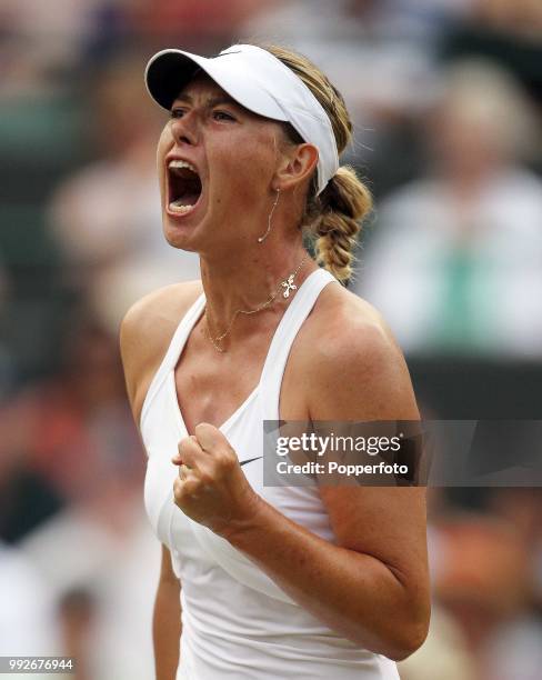 Maria Sharapova of Russia celebrates after winning against Barbora Zahlavova-Strycova of the Czech Republic in the Womens Singles third round on day...