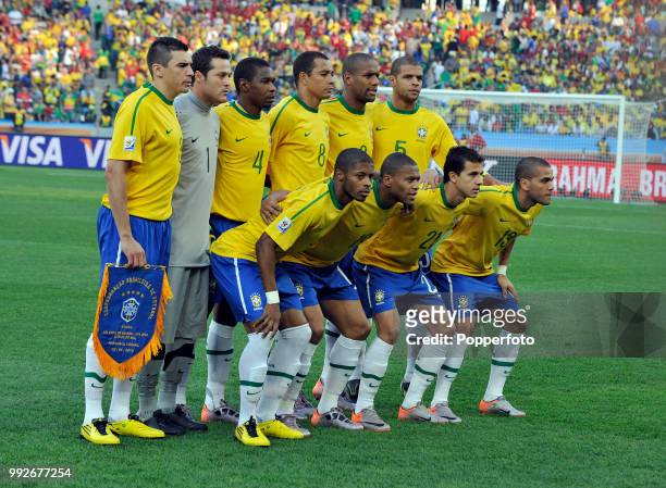 Brazil line up for a group photo before the FIFA World Cup Group G match between Portugal and Brazil at the Moses Mabhida Stadium on June 25, 2010 in...